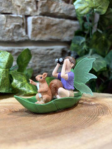Little Glow Fairy Boy In Leaf Boat